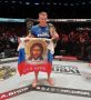 Лион, Франция. Российский боец после победы вышел в октагон с триколором, на котором изображён лик Иисуса Христа
